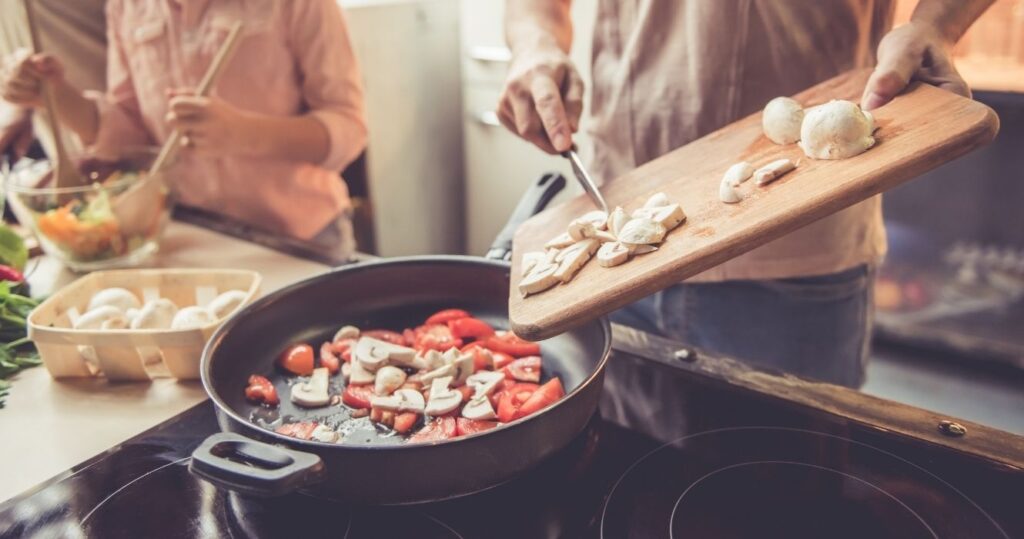 a family cooking at home